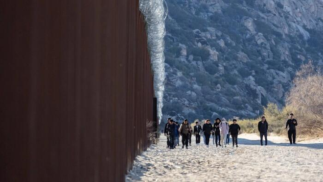 Chinese nationals at the border wall