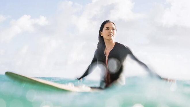 Tulsi Gabbard surfing